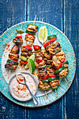 Chicken and vegetable skewers with yoghurt dip