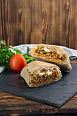 Stuffed ciabatta with minced meat, peppers and mozzarella