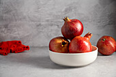 Fresh pomegranates in a bowl