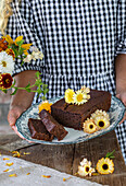 Beetroot and chocolate cake with edible flowers