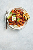 Mexican picadillo with rice and tortilla