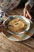 Cream of fennel soup with ravioli, smoked salmon and mascarpone