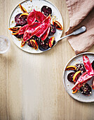 Salad with beetroot, tamarillo, cashews and red chicory