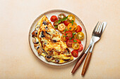 Mushroom omelette with cherry tomato salad