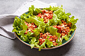 Lettuce wraps filled with minced meat and peanuts