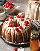 Raspberry bundt cake with passion fruit syrup