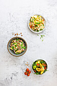 Three filling salads - tuna salad, lentil salad with apple, chicken salad