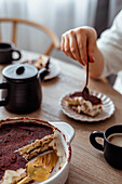 Sliced tiramisu with coffee