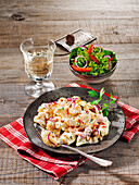 Alsatian flour dumplings with grainy cream cheese and bacon