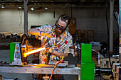 Artist using glassforming technique