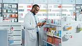 Pharmacist using tablet