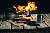 Puff pastry and tea while camping by the campfire at night