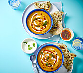 Vegetarian bulgur vegetable soup with mint oil and potato flatbread