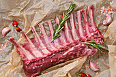 Raw rack of lamb with rosemary and garlic