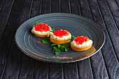 Canap�s with ricotta and salmon caviar