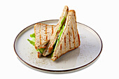 Club sandwich with salmon, cucumber and salad