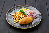 Kiev cutlet with chips and coleslaw