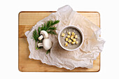 Cream of mushroom soup with croutons and dill