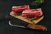 Raw beef ribs with rosemary