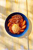 Apricot ice cream with goji berries and honey biscuits