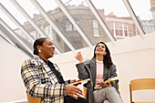 Businesswomen talking in office