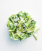 Caesar salad with parmesan and green snack sticks