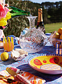 Cheerful table decoration with fish-shaped glass bottle