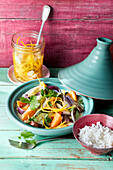 Vegan tagine with coconut milk and fermented orange peel