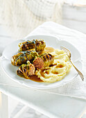 Cabbage rolls with mashed potatoes and gravy