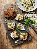 Matjes tartare on brown bread with fresh samphire