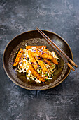 Asian herb salad with tempeh and sprouts