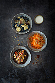 Berry muesli, carrot and apple salad, chocolate chia pudding
