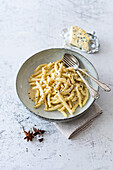 Casarecce Quattro Formaggio with star anise and shot