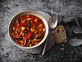 Fiery goulash and bean pot