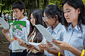 Street performance, students explain to passers-by the story of Sadako Sasaki, who turned the paper crane into a symbol of peace, on August 6, at the Peace Memorial Park, during the 79th anniversary, Hiroshima, Japan.