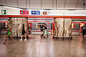 People in Prague Metro platform