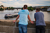 People watching the views from Charles Bridge in Prague