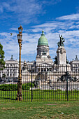 The National Congress Building behind the Monument of the Two Congresses in Buenos Aires, Argentina.