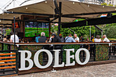 Patrons in a restaurant & bar in the revitalized Puerto Madero section of Buenos Aires, Argentina.