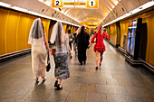 People in Prague Metro platform