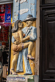 A bas relief sculpture of tango dancers on the front of a souvenir shop in Caminito, La Boca, Buenos Aires, Argentina.