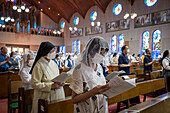 Night mass on August 9th, every year, in memory of the victims of the atomic bomb. Urakami Cathedral, Nagasaki, Japan