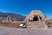 A modern pyramid built in the ruins in the Pucara of Tilcara, a pre-Hispanic archeological site near Tilcara, Argentina. The pyramid is a memorial to the archeologists who excavated the ruins.