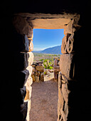 View from inside a reconstructed room in the ruins of the Pucará of Tilcara. Tilcara, Argentina.