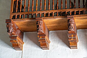 Carved faces on wooden supports of the choir loft in the Church of the VIrgin of the Rosary & St. Francis in Tilcara, Argentina.