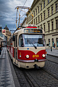 People waiting for the tram in Prague