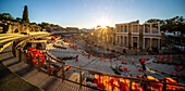 Merida, Spain, Aug 15 2024, Stunning sunset view of the Roman Theatre in Merida, Spain, as it prepares for an upcoming performance. The ancient architecture glows in the evening light, creating a captivating atmosphere.