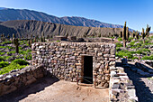 Partially reconstructed ruins in the Pucara of Tilcara, a pre-Hispanic archeological site near Tilcara, Humahuaca Valley, Argentina.