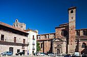 Visitors admire the stunning Cathedral and vibrant Plaza Mayor in Sigüenza, a historical gem in Guadalajara, Castile-La Mancha.