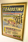 A poster advertising the radio broadcast of 1958 automobile race in the Argentine Automobile Club Museum, Buenos Aires in Argentina. The race was the 36th Gran Premio Argentino de Carretera 1958.